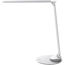 An ac outlet and a usb port in the large, heavy base, both of which are handy when you don't want. Taotronics Led Desk Lamp Metal Table Lamp Usb Charging Port Eye Care Dimmable Adjustable Durable 5 Color Modes 5 Brightness Levels Memory Official Member Of Philips Enabled Licensing Program Amazon Com