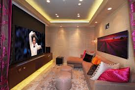 If you're using pictures with muted colors in your gallery wall, try contrasting them with bold black and brown photo credit: Stay Entertained 20 Lovely Small Home Theaters And Media Rooms