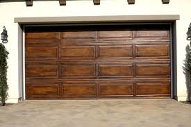 Have Your Garage Door Faux Finished To Simulate Wood Yes Most Of These Photos Are Standard Me Faux Wood Garage Door Wooden Garage Doors Metal Garage Doors