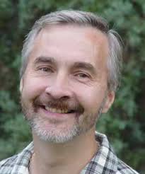 Assistant Professor Sadanand Dhekney describes his winter- hardy grape  rootstock research during the Powell Research and Extensi