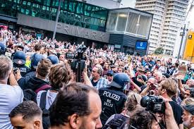Demonstrators walk along bismarckstrasse in berlin, sunday aug. Lkojjfoozvks1m