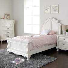 The pieces are made of solid rubberwood and painted white, and the shiny rounded pulls add a touch of modern minimalism. With All The Grace And Charm Of A Treasured Antique The Amelia White Bedroom Set Will Be A Dream Girls Bedroom Sets White Bedroom Set Girls Bedroom Furniture