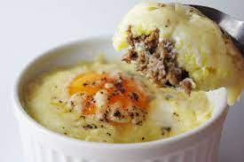 Breakfast In A Ramekin Baked Eggs With Polenta And Sausage Sausage Recipes Food Ramekin Recipe