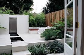 Small Rear Garden In St Albans Hertfordshire With White Limestone Recessed Urban Garden Design Small Urban Garden Design Small Urban Garden