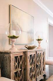 Use dining room storage to display your best dishes and trinkets in style! Dining Room Buffet This Stunning Buffet Is By Classic Home Dining Room Buffet Diningr Dining Room Buffet Decor Dining Room Buffet Table Buffet Table Decor