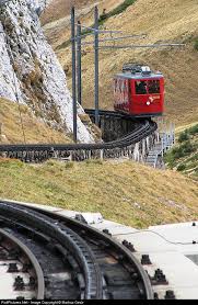 Railcar From Pilatus Kulm 2073 Meters Over Sealevel To Alpnachstad Leaves The Upper Station Downhill That S Why The Pantogr Train Train Travel Train Journey