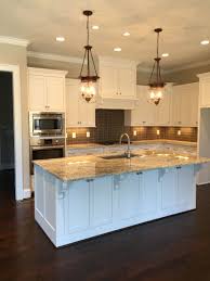 Sherwin Williams Pure White Cabinets Worldly Gray Walls White Ice Granite Dark Gray Straight St Kitchen Cabinets Grey And White Kitchen Remodel Kitchen Redo
