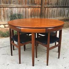 The design is simple, elegant and with a hint of traditional. The Chairs Fit Perfectly Underneath The Table Designporn