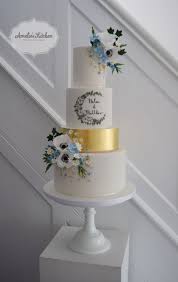 Wildflower Wedding Cake With Monogram Matching The Couples Invitations At Hengrave Hall Suffo Wedding Cake Prices Cake Decorating Classes Wedding Cake Designs