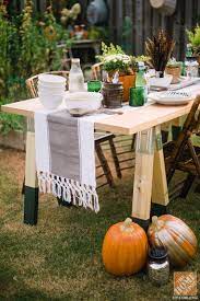 Diy Sawhorse Table Tutorial The Home Depot Saw Horse Diy Saw Horse Table Outdoor Decor