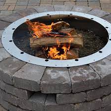 Fire pit ring inserts come in a wide variety of sizes and shapes, levels of quality, and in many cases, unique features that make an outdoor fire pit more versatile and/or perform better. Firebuggz 31 Round Stainless Steel Fire Pit Insert Campfire Fun Pit Firebuggz