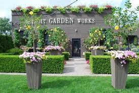 Detroit Garden Works Incredible Storefront Curb Appeal Using Flowers And Gardens To Achieve It There Is No Bett Garden Works Unique Gardens Garden Photos