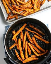 Cut each sweet potato in half lengthways. Air Fryer Sweet Potato Fries Ninja Foodi Recipe Air Fryer Fanatics