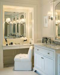 The tables have a lot of space on the tops and have drawers. Built In Makeup Vanity Traditional Bathroom Jan Gleysteen Architects