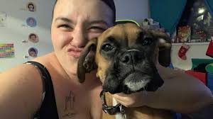 How to help a boxer dog cope with the loss of its sister?