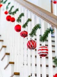 15 Ways To Decorate The Staircase This Holiday Season Diy Christmas Garland Christmas Stairs Decorations Christmas Staircase Decor