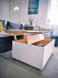 Table basse transformable en table haute, convertible et extensible par ouverture portefeuille. Table Basse Leve Toi Au Boulot Cocotte