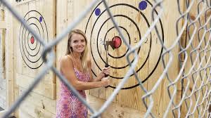 Hold the axe in both hands. Try Your Hand At Axe Throwing Atlanta Axe Master