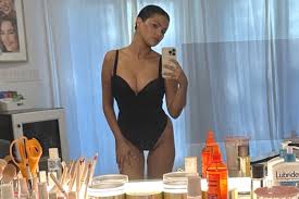 Selena Gomez Poses in Black Lingerie for Chic Bathroom Mirror Selfie