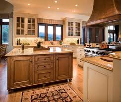 Maybe you would like to learn more about one of these? Love The Combo Of The Cream Cabinets With The Wood Trim And Island Kitchen Remodel Time Stained Kitchen Cabinets Kitchen Design Luxury Kitchens