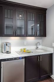 Photo Gallery Of Remodeled Kitchen Features Cliqstudios Dayton Painted White Cabinets With Center Is Crockery Unit Design Shaker Style Furniture Kitchen Design