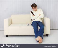 Picture Of A Gloomy Man Sitting On Couch In Front Of Tv With tenor, maker of gif keyboard, add popular sitting on the couch animated gifs to your conversations. picture of a gloomy man sitting on couch in front of tv