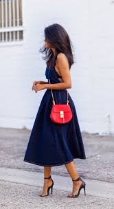 Black And Navy Blue Outfits Dark Denim Midi Dress Black Lace Bralet Black Leopard Print High Heel Sandals Bright Red Crossbody Bag Windswept Hair Fashion Style Casual Chic