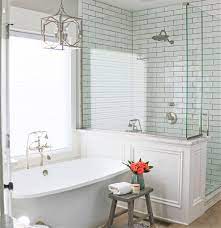 Surrounds can be constructed in many styles, ranging from a single row of ceramic tile that serves as a kind of backsplash around the tub, to fully covered walls that encase the three sides of a bathtub or shower alcove. Small Bathroom With Tub And Shower Ideas Novocom Top