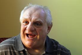 Abused former Ladd resident loves current group home, upset by cuts