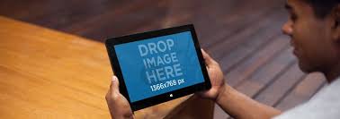 Placeit Mockup Of A Young Man Using A Windows Surface Tablet Windows Surface Surface Tablet