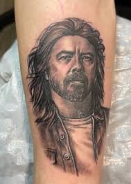 Me showing Dave Rave my Frankie tattoo. Also me infront of the Hamilton  murual