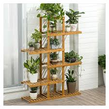 Bay Isle Home Dulcie Plant Stand Wayfair In 2020 Plant Shelves Wooden Plant Stands Wood Plant Stand