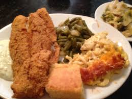 The outside might be crisp, but the fish is tender and flaky on the inside! Southern Fried Catfish Mac N Cheese Green Beans Cabbage And Cornbread From Sweetie Pie S A Soul Foo Soul Food American Mac And Cheese Quick Side Dishes