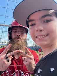 Phillies kids signing autographs here at spring training  practice,Clearwater,Fl
