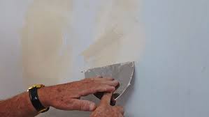 Cut from the center of the hole, out to each corner of the square using a drywall saw on wallboard. How To Fix A Hole In A Plaster Wall Bunnings Australia