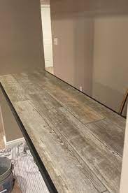 Our porcelain wood tile is available in a spectrum of styles from reclaimed rustic to modern gray washed. Ceramic Faux Wood Tile For A Bar Top Faux Wood Tiles Outdoor Kitchen Countertops Tile Countertops