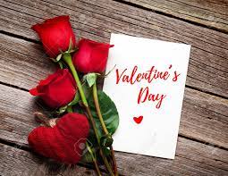 Maybe you would like to learn more about one of these? Valentines Day Greeting Card Red Rose Flowers And Heart On Wooden Table Top View With Copy Space Stock Photo Picture And Royalty Free Image Image 92921355
