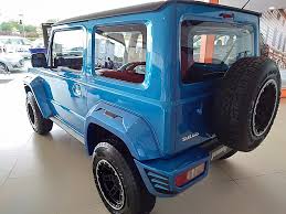 Suzuki jimny has 5 images of its exterior, top jimny 2021 exterior images include front angle low view, front side view, rear angle view, grille view and medium angle front view. File 2021 Suzuki Jimny Allgrip 1 5 Auto Bodykit Blue Rear View In Brunei Jpg Wikimedia Commons