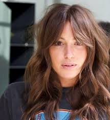 A pixie cut is a short women's haircut you typically see on a fashionably gamine woman. Long Layered Haircut Long Curtain Bangs 70s