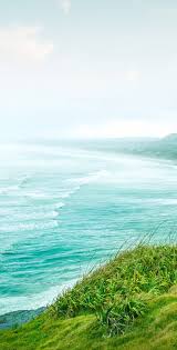 Using a phone while driving slows reaction times (notably braking reaction time, but also reaction to traffic signals), and makes it difficult to keep in the correct lane, and to keep the correct following distances. Green Grass Ocean Sea Cliffs Wallpaper Galaxy Tranquil Beauty Nature Peaceful Calming Samsung S Galaxy S8 Wallpaper S8 Wallpaper Pretty Wallpapers