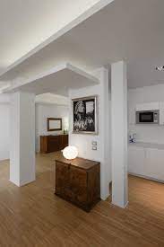 Soggiorno Moderno Di Homify Moderno Legno Effetto Legno Homify Soggiorno Moderno Case Di Design Industriale Colonne Da Arredamento