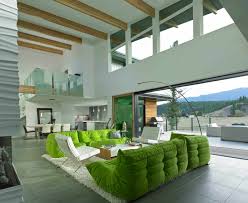.island, canada was designed by new york architect joel turkel and became a modified version of one of description by turkel design. This Living Room In Green And White Is So Uplifting