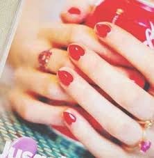 Simple red manicure with white heart accent nail. Red Hearts And Lots Of Love Nail Designs Nails Redesigned