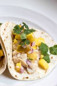 Broil, rotating the pan from front to back once, until the salmon is starting to brown, is opaque on the sides and the thinner parts of the fillet are sizzling, 5 to 8 minutes, depending on thickness. Grilled Fish Tacos With Pineapple Salsa Dash Of Herbs