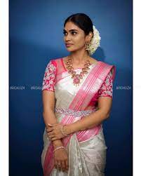 In A Bridal Look In Pink Silver Color Pattu Kanjeevaram Saree Short Sleeve Blo Saree Blouse Designs Latest Bridal Blouse Designs Silk Saree Blouse Designs