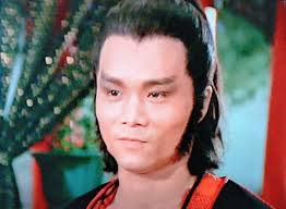 Behind the scenes of "The Return of the Condor Heroes" (1983) In the middle  is Louis Cha (aka Jin Yong), author of "The Condor Heroes Trilogy" and many  other wuxia classics, standing