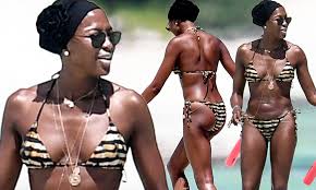 Naomi campbell bumps into ex flavio briatore on kenyan trip. Naomi Campbell 48 Looks Incredible In Tiny Striped Bikini For Fun Boat Ride During Kenya Getaway Daily Mail Online