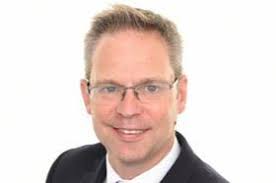 CEO move paves way for trust takeover