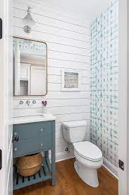 Premium selection of designer fabrics & wallpapers. White And Blue Powder Room With Accent Wall Wallpaper Cottage Bathroom
