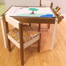 Our Ikea Latt Hack Art Table Vinyl Upholstered Seats Chalkboard Top Roll Of Art Paper Mounted Underneath Kid Table Table Art Table